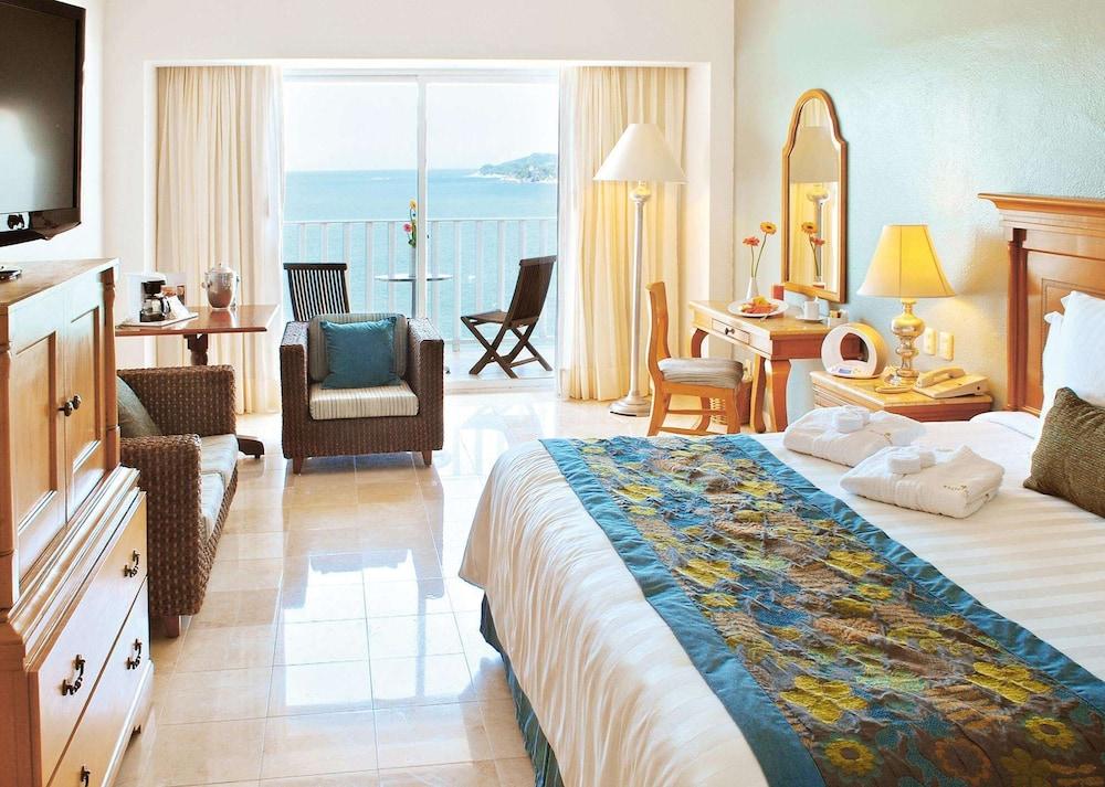 Emporio Acapulco Hotel Екстериор снимка A typical room at the resort